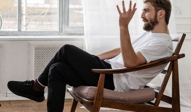 man sitting in counselling session