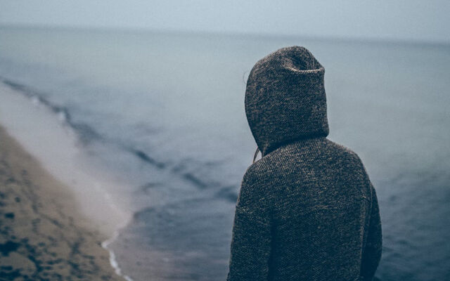 why depression happens - walking on beach alone